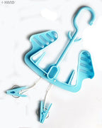 Shoe drying rack hanger holding a pair of shoes securely.