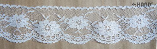White non-stretch nylon lace borders on a roll, 58 mm wide.