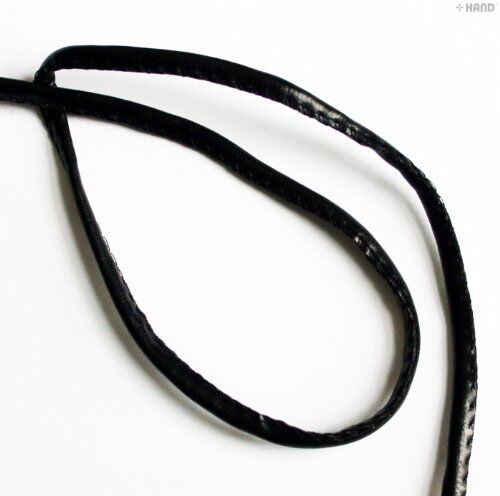 Craft project using black faux leather trim for embellishment