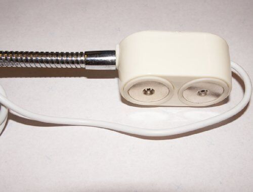 Lamp demonstrating adjustable positioning for precise lighting