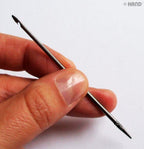 Display of straight and curved needles for versatile use.