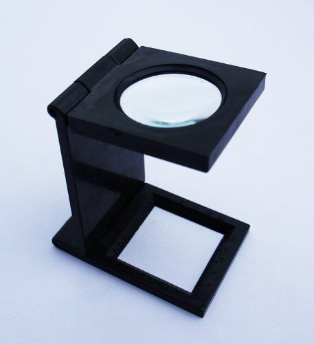 Fold-flat linen tester with a plastic stand for easy use.