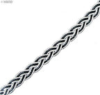 Close-up of the black and silver braid trim showing intricate plaiting.