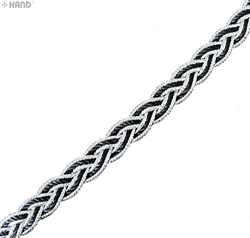 Close-up of the black and silver braid trim showing intricate plaiting.