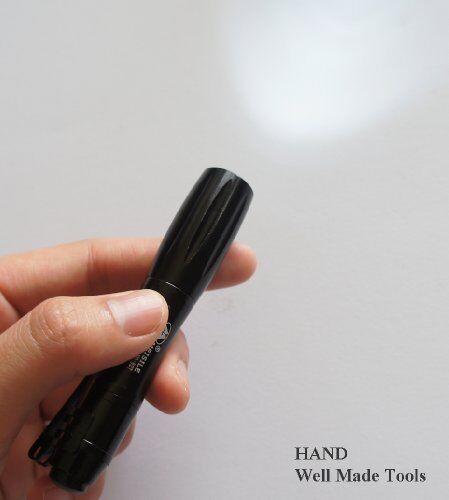 Close-up of a super bright mini torch showcasing its design.