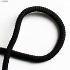 Close-up of 6mm black cord trimming showing texture.