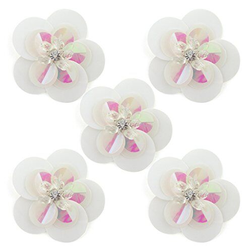 Large white round sequin and diamante flower trim on fabric.