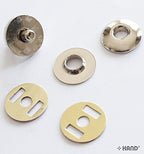 Close-up of silver magnetic clasp showing eyelet design.