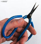 Close-up of the blade of the blue heavy duty scissors