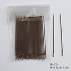 Display of multiple thin sewing needles from the C4 pack