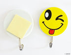 Close-up of a Smily Face hook showing its adhesive backing