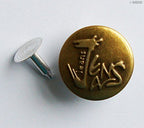 Assorted vintage gold No5 jeans buttons arranged neatly for crafting.