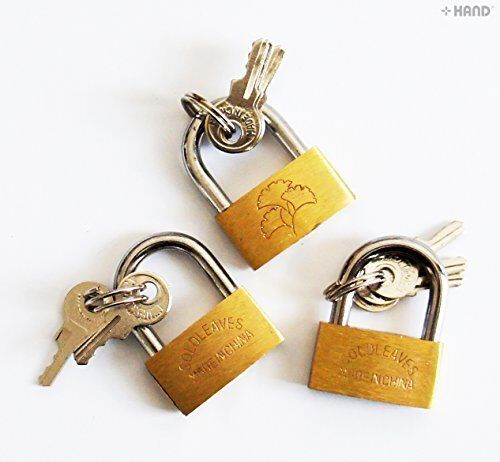 Three brass luggage padlocks displayed together