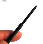 Close-up of a small metal chisel with a wooden handle