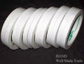 Six rolls of 5mm wide removable double sided tape
