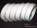 Close-up of economy double sided tape rolls in packaging