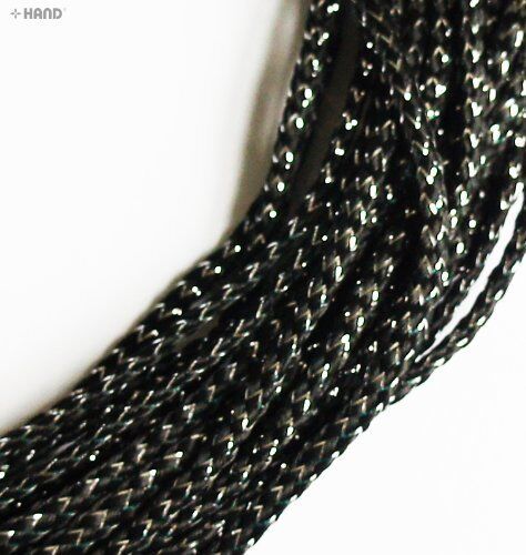 Black and silver string trim on a spool