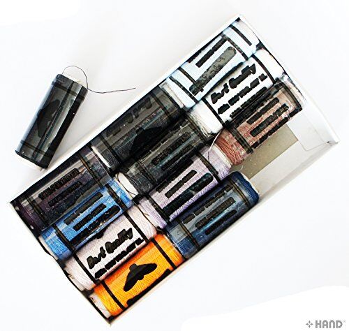 Twelve assorted colour spools of sewing thread displayed together.