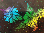 Dramatic rainbow colours revealed on scratch art paper