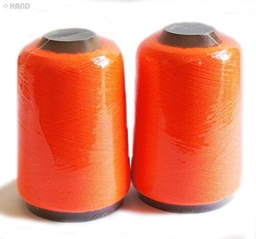 Neon pink thread being used in a sewing project, highlighting its application.