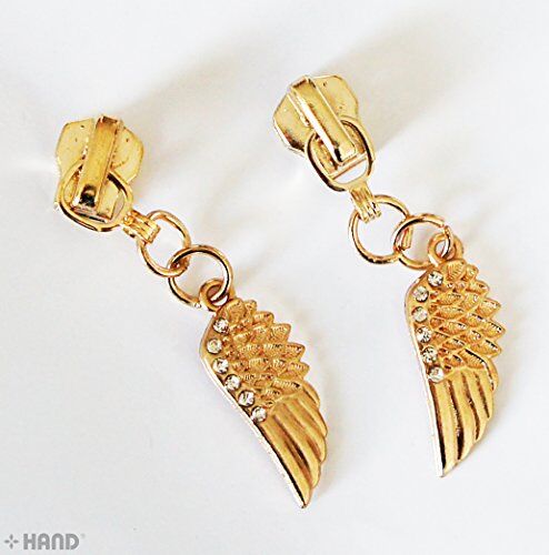 Display of gold tone zip pulls with head slider