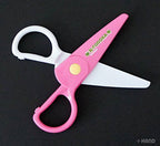 Close-up of colourful plastic scissors for children