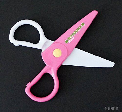 Close-up of colourful plastic scissors for children