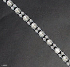 Close-up of crystal clear rhinestones trim on a roll