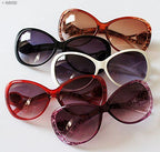 Side view of assorted colours in ladies sunglasses pack.