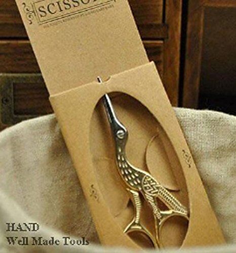 Close-up of the fine point of the stork embroidery scissors.