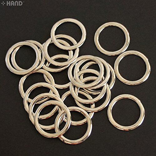 Close-up of metal silver tone shoe handbag rings, 2.5cm size.