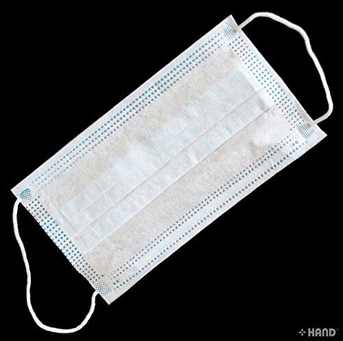 Side view of a 3 ply face mask with earloops