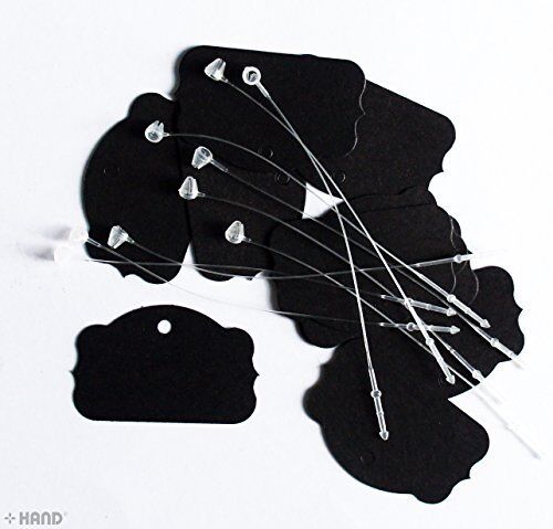 Assorted colours of small shaped paper tags with nylon string