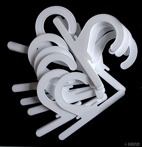 Close-up of a white plastic hanger showing its design.