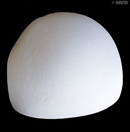 Close-up view of the soft texture of the white bra pads.