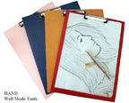 Light weight large clip board on a table