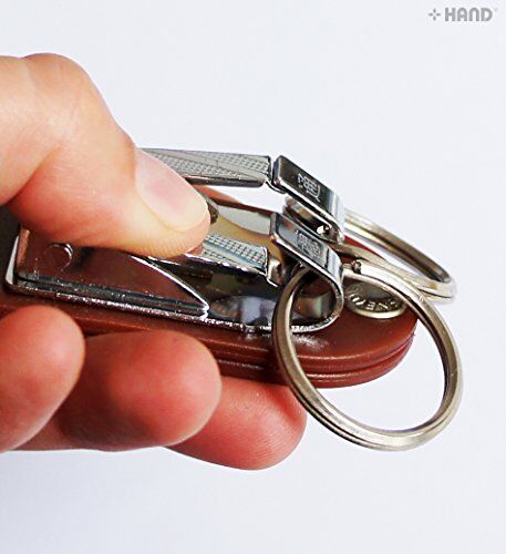 Keyring buckle displayed with a measuring tape for size reference.