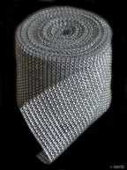 Clear diamante ribbon trim in silver colour on a spool