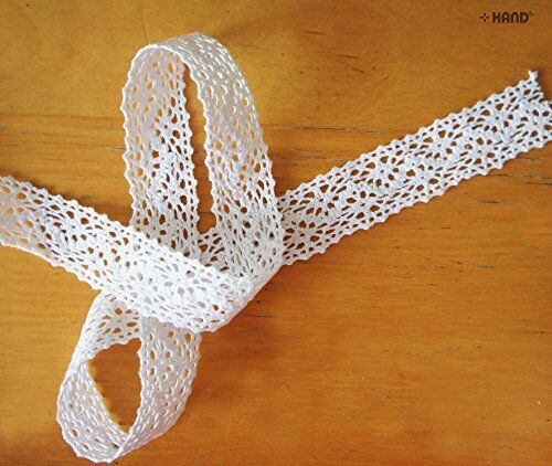 Lace trim used in a garment decoration project.