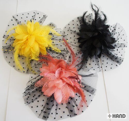 Assorted No.5 spot net flower brooches with metal clips and pins.
