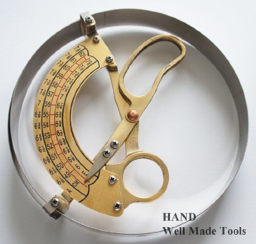 Stainless steel H-2211 hat measurer showing measurement scale.