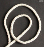 Cream rope cord coiled neatly for easy use