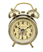 Side view of the stylish metallic alarm clock showcasing its dimensions.