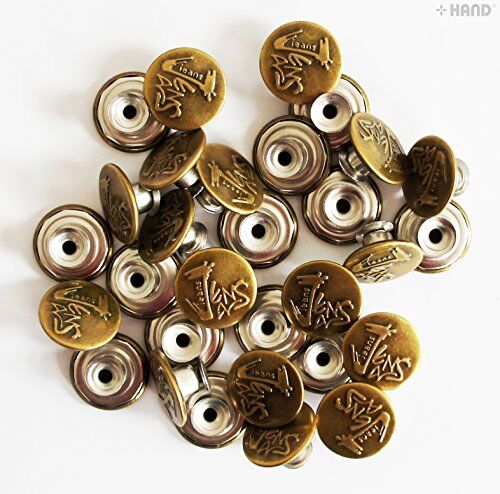 Pack of No10 antique gold jeans buttons displayed