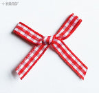 Variety of uses for chequered bow trims in crafting