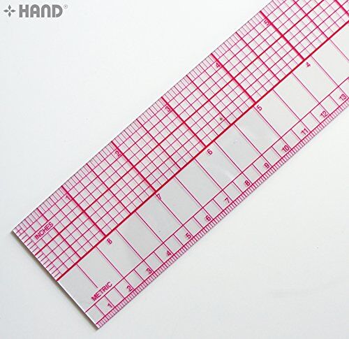 B95 ruler being used to measure fabric for quilting