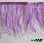 Ostrich feather fringe trim in lilac, 4 inches wide.