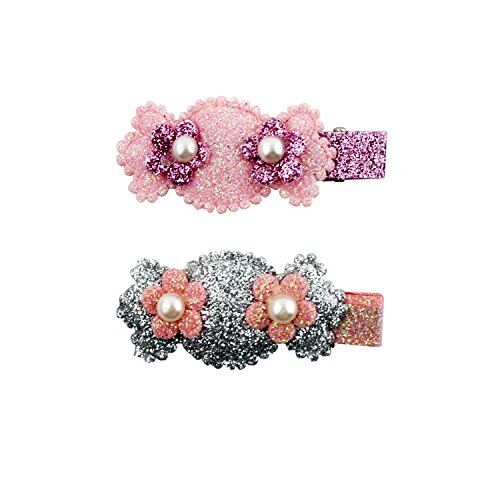 Display of two glittery hairclip barrettes on a white background