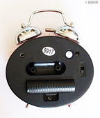 Alarm clock showing time with a colourful design