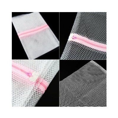 Laundry mesh bag with pillowcases ready for washing